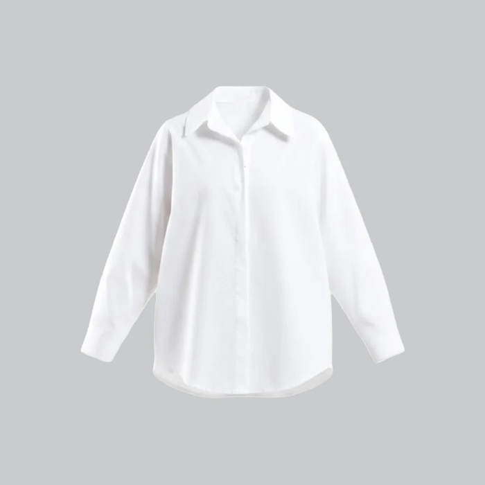 شومیز زنانه سفید با طرح قلب از برند بهبود (Behboud) تهیه شده از جنس پوپلین.